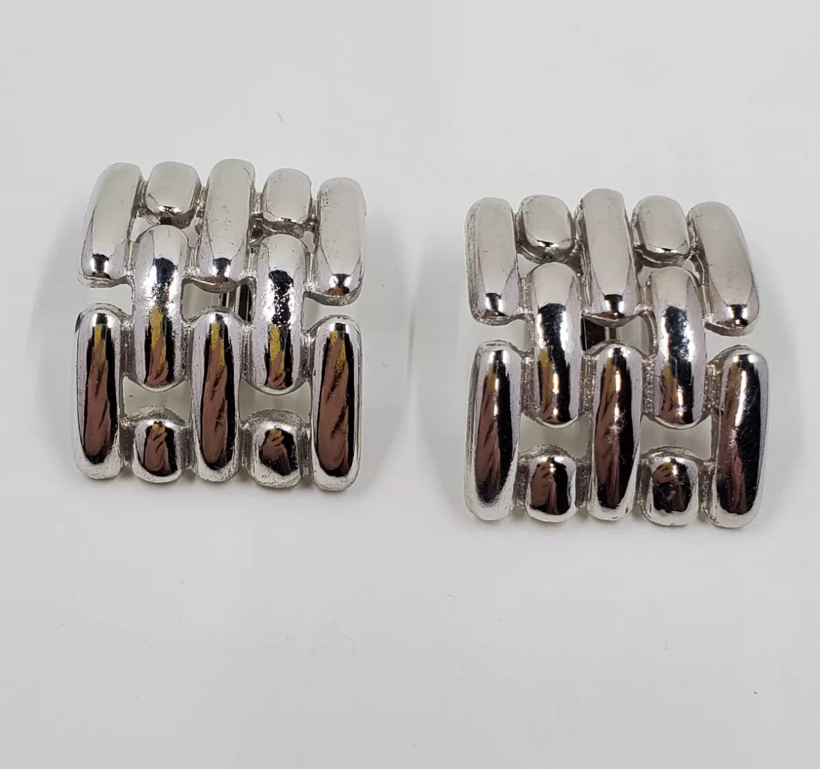 Silver Tone Clip On Weave Earrings