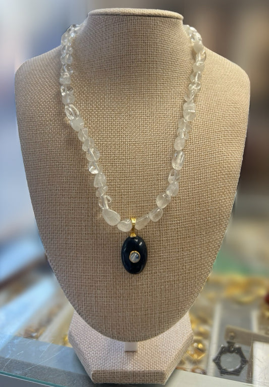 White Beaded Necklace with Blue Charm