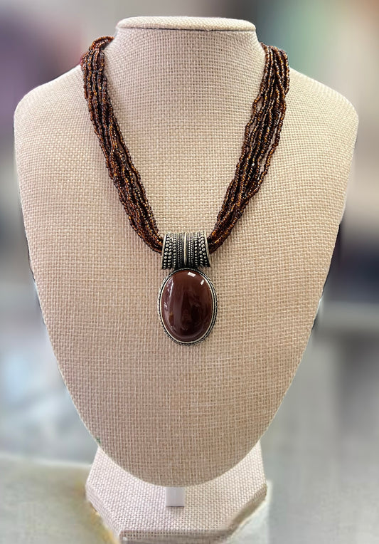 Brown Beaded Necklace And Brown Stone Charm