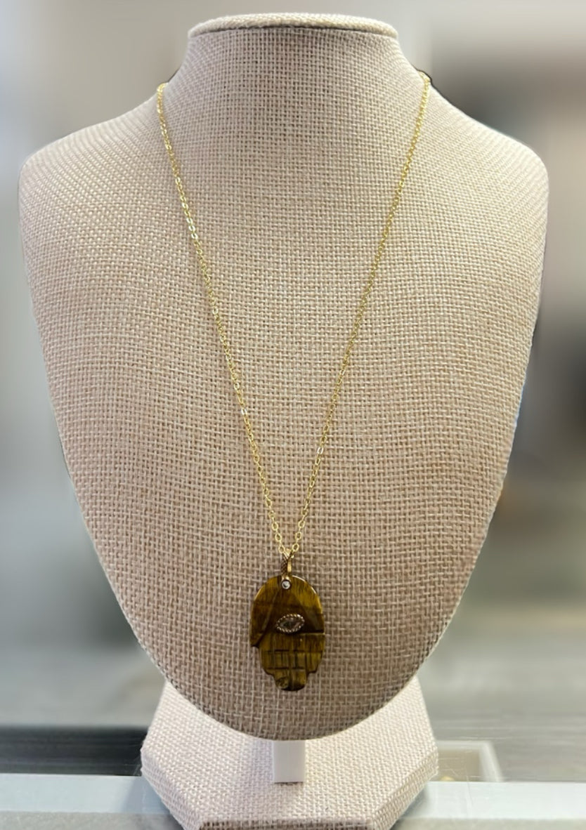 Brown Hand With Gold Chain Necklace