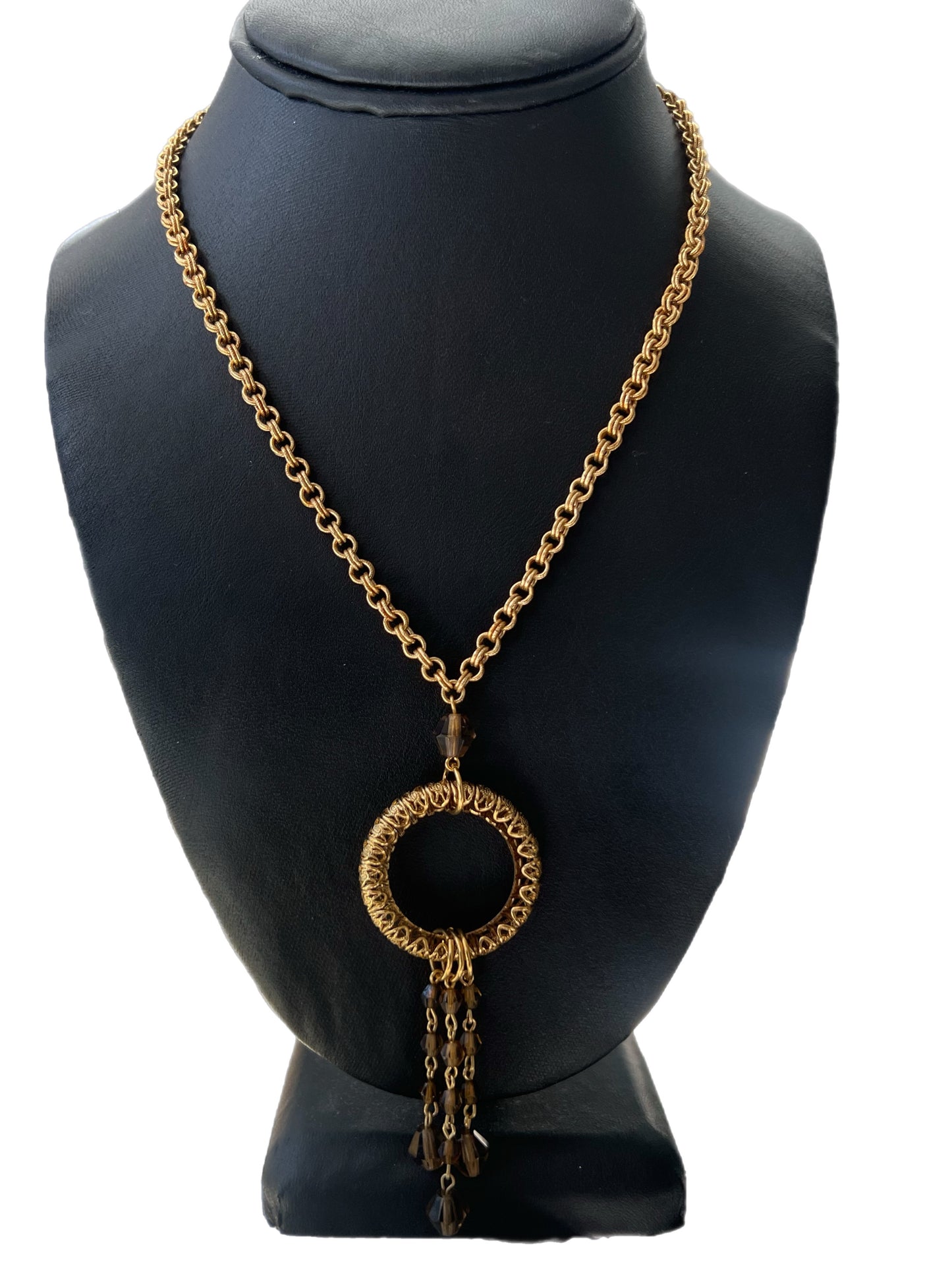 Gold Circle Pendant And Brown Beaded Tassel